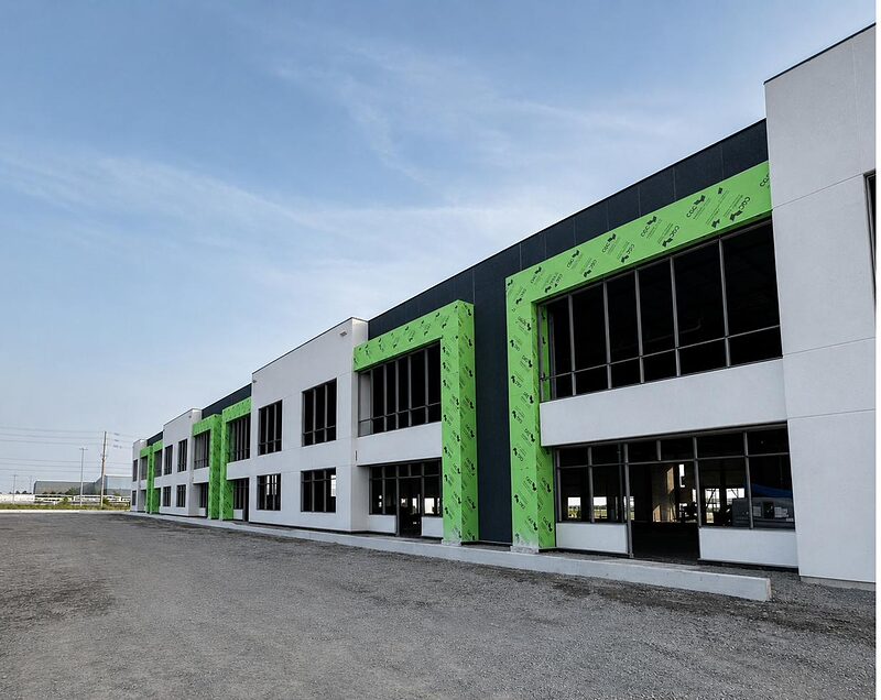 Two-storey commercial buildings with exterior sheathing accents