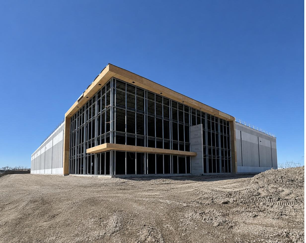 Commercial building exterior with curtain wall glazing and wood fascia