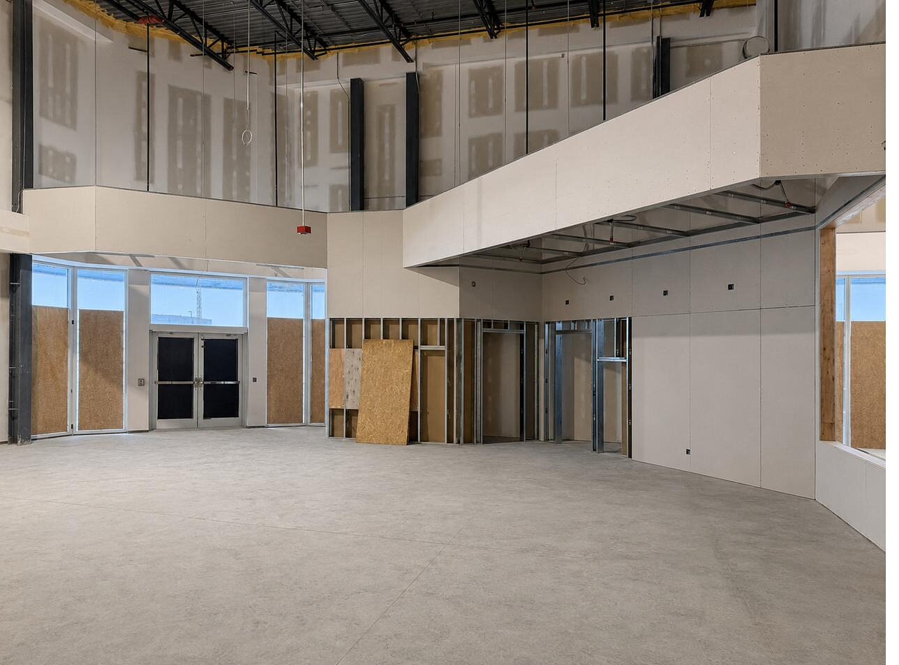 Commercial interior with drywall bulkheads and framed openings